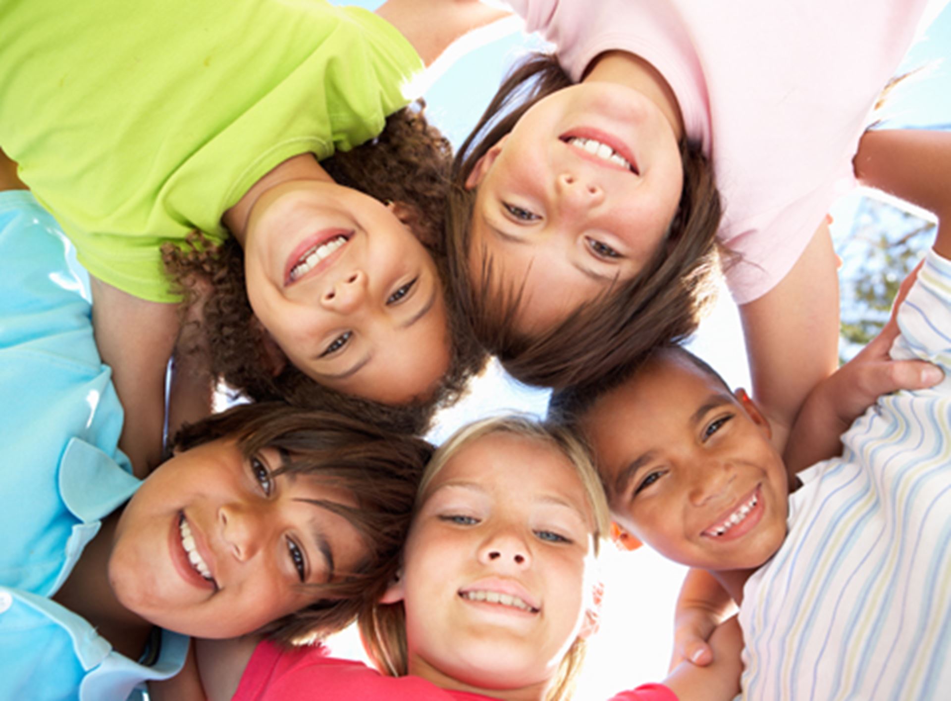 Group of children hugging each other